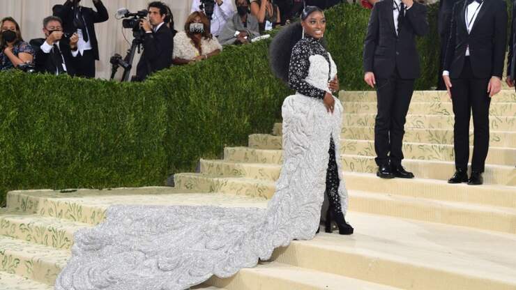 Simone Biles Wows Met Gala Red Carpet With 98-Pound Dress | iHeartRadio