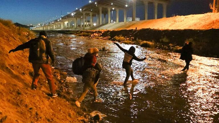 TOPSHOT-MEXICO-US-HAITI-MIGRATION