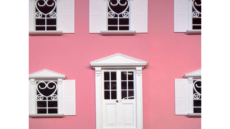 Facade of pink miniature dollhouse