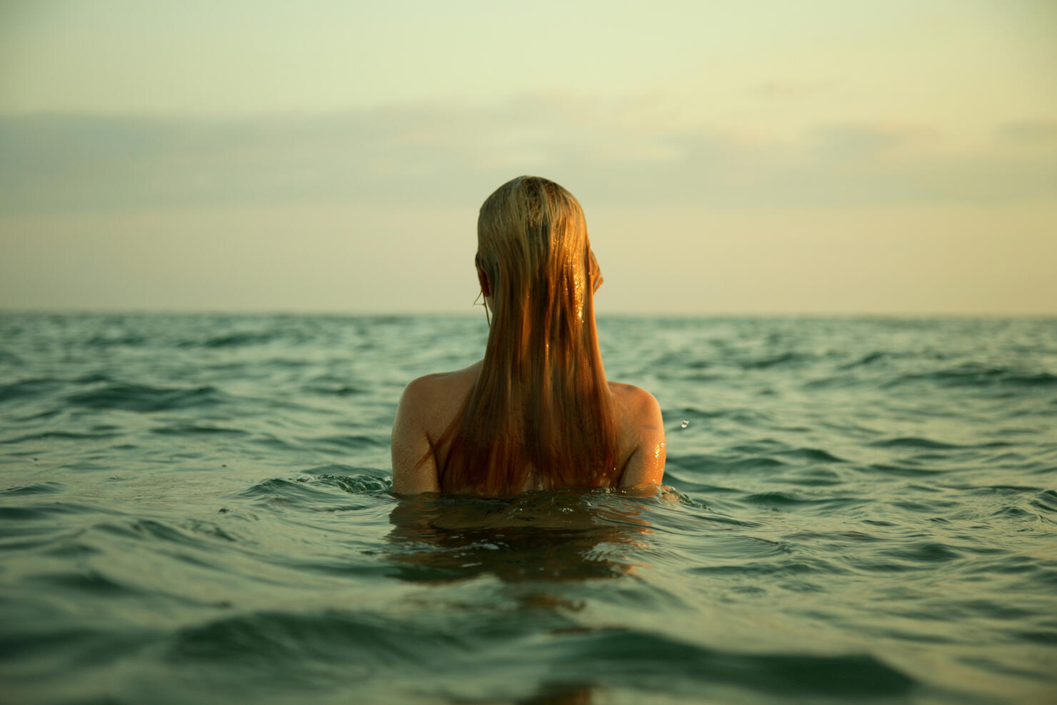 girl in sea waves