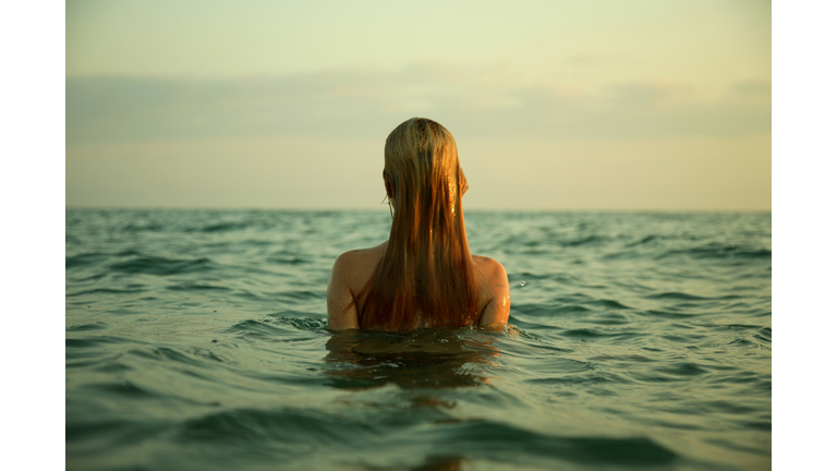 girl in sea waves