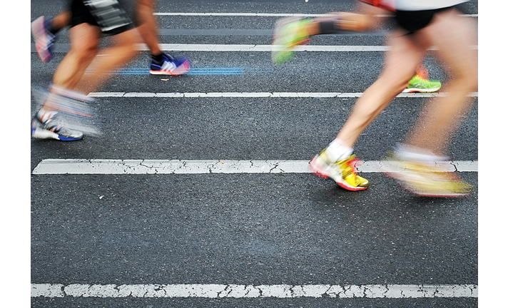 Low Section Of People Running In Marathon