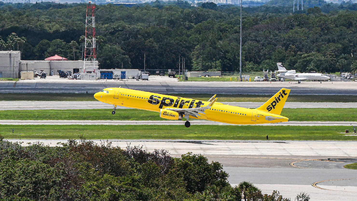 A Spirit Airlines aircraft takes off at Orlando