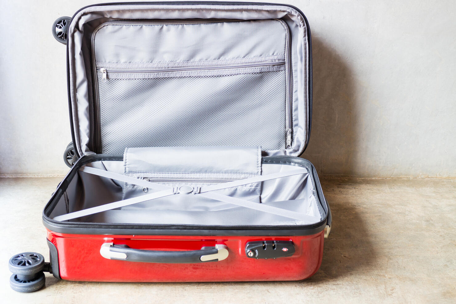 Open Luggage On Floor At Home