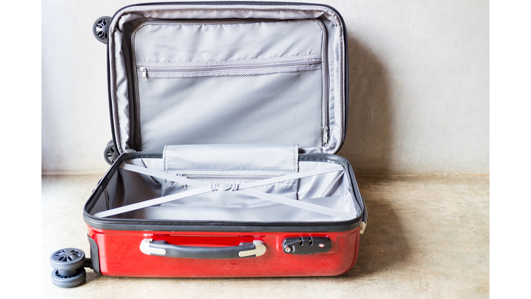 Open Luggage On Floor At Home