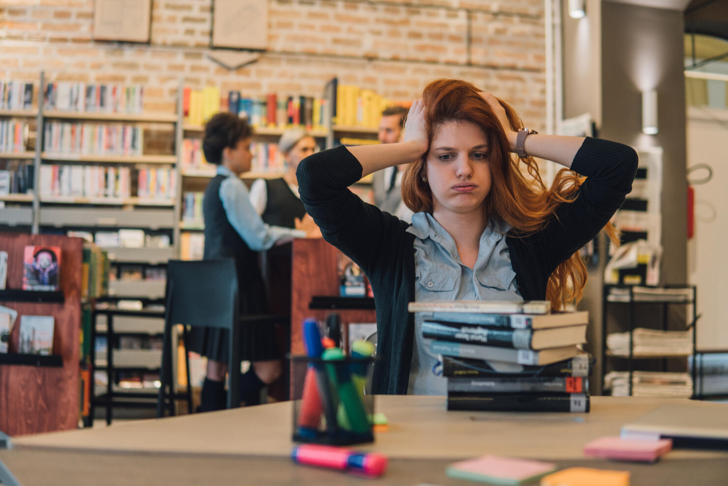 Nervous student in library