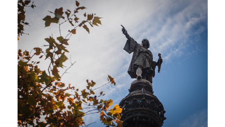 Monument Of Christopher Columbus Against Cloudy Sky