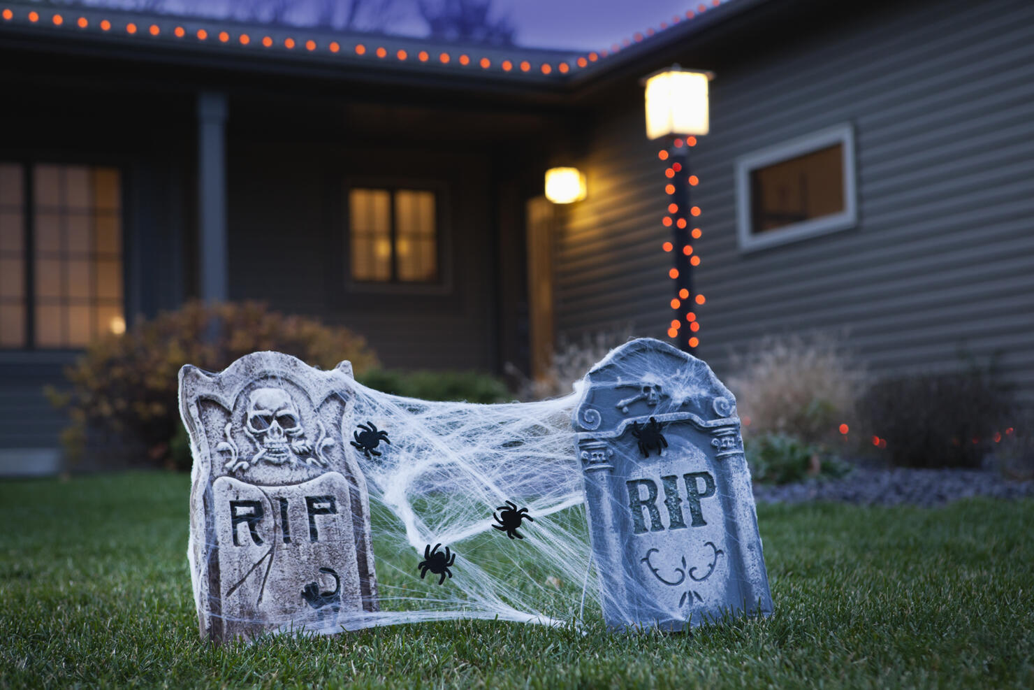 USA, Illinois, Metamora, Halloween gravestone decoration on lawn