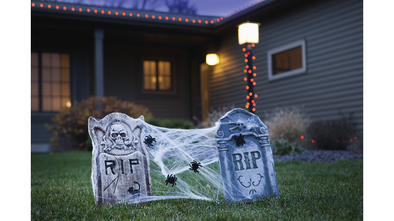 USA, Illinois, Metamora, Halloween gravestone decoration on lawn