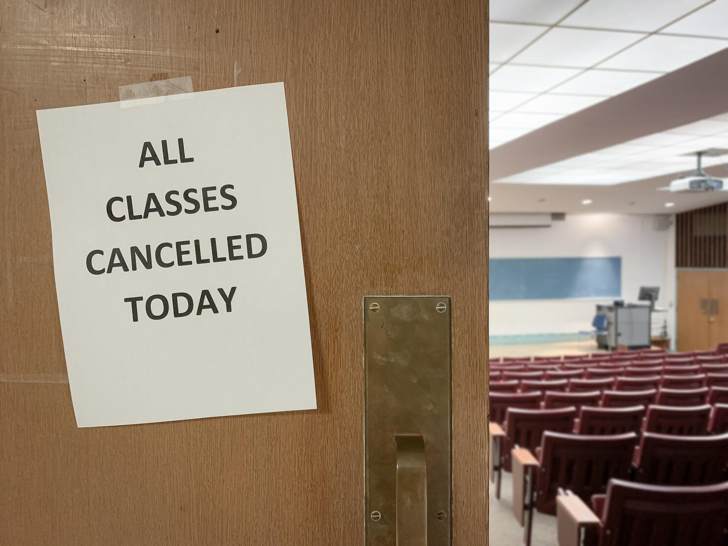Close-Up of a Cancellation Notice Outside of a Classroom