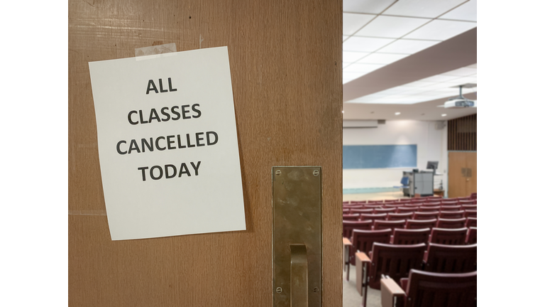 Close-Up of a Cancellation Notice Outside of a Classroom