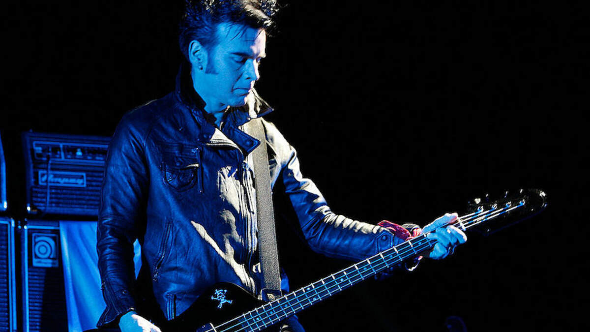 Simon Gallup says he is back in the Cure