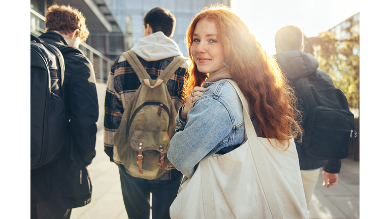 Female student going for class in high school