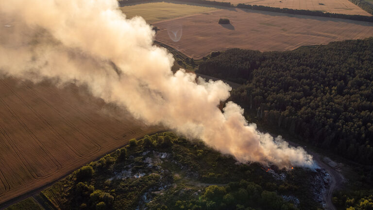 Drone photo of burning wastes at garbage site