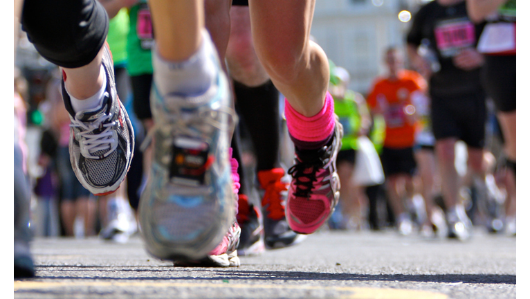 Marathon Runners close up legs and shoes