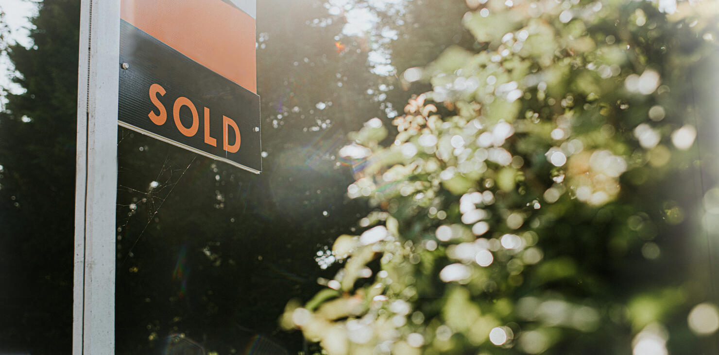 'SOLD' real estate sign outside a Property