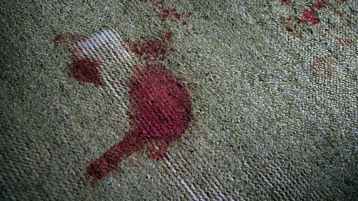 Homeowner Finds 'Suspicious' Red Stains Under Carpet of 110-Year