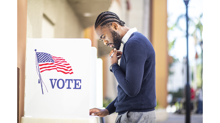 Millenial Black Man Voting in Election
