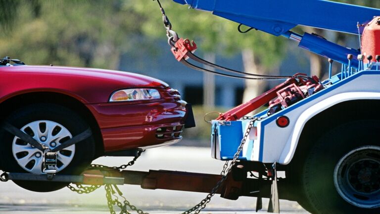 Tow truck and car