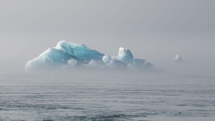 Video: Tourist Posing for Photo on 'Ice Throne' Gets Swept Out to Sea