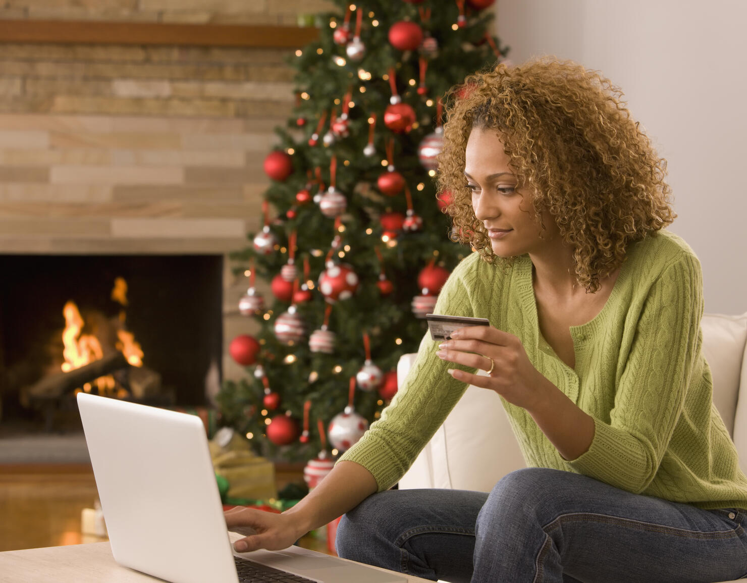 Mixed race woman shopping online