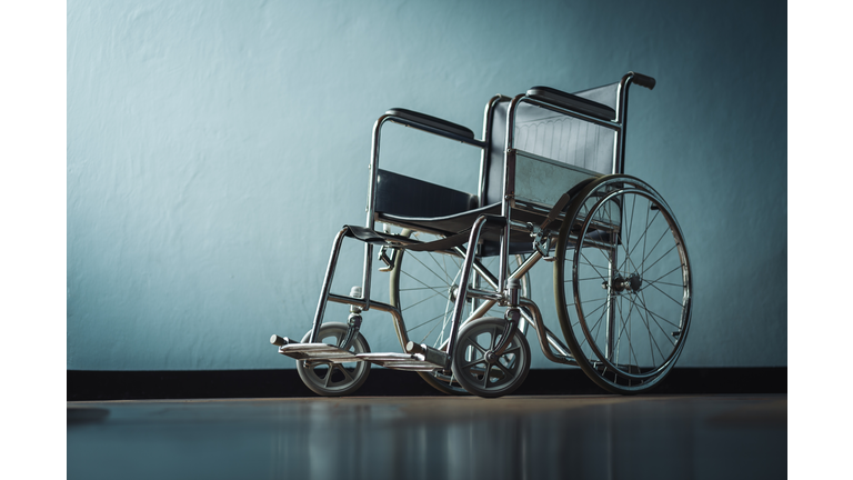The old wheelchair in the hospital room with light from the window