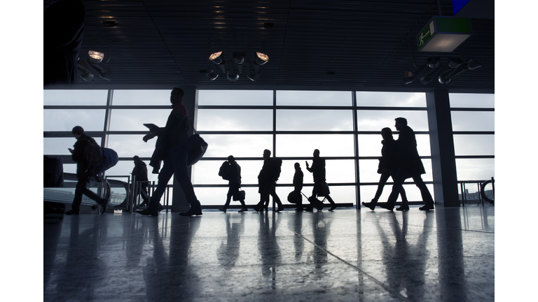 People rushing to departures lounges