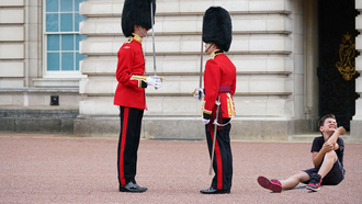 Video Shows Royal Guard Plow Into, Step On Child As Shocked Tourists Watch