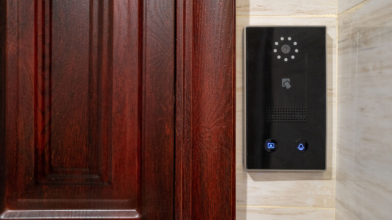 Smart door lock at the door of the room
