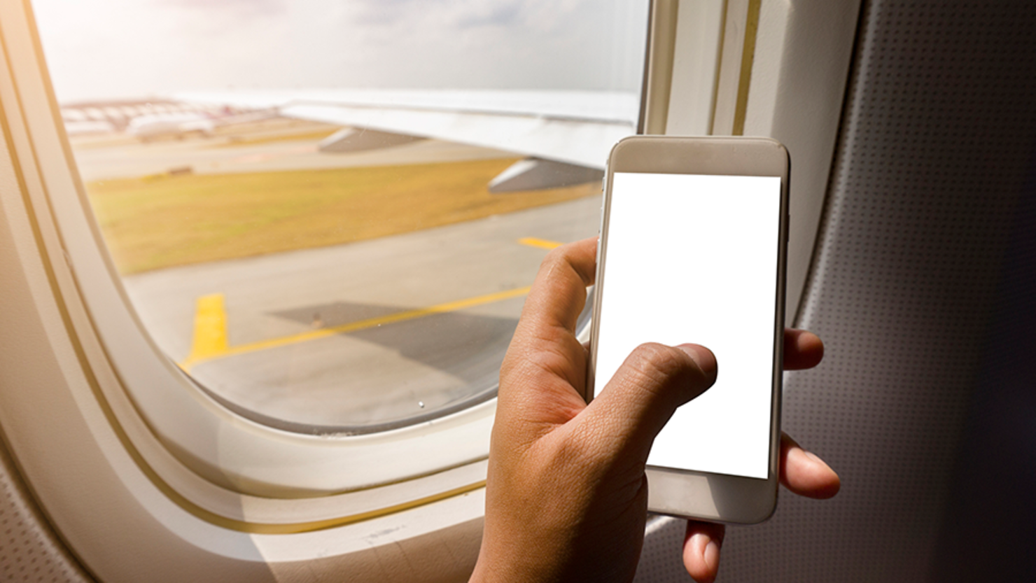 Experts Warn Of An Incredibly Dangerous Place To Put Your Phone On A Plane