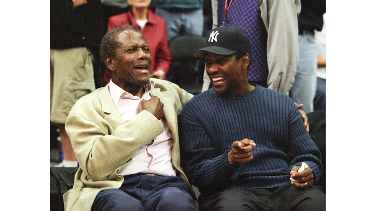 Sidney and Denzel at Game Two of the NBA Playoff with the Los Angeles Lakers