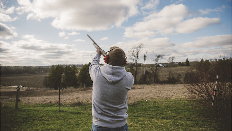 Man skeet shooting