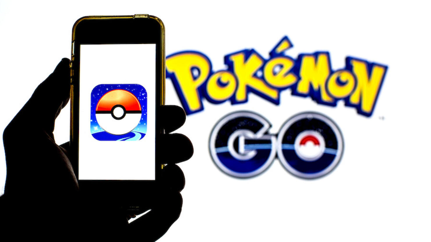 In this photo illustration a Pok√©mon GO app seen displayed