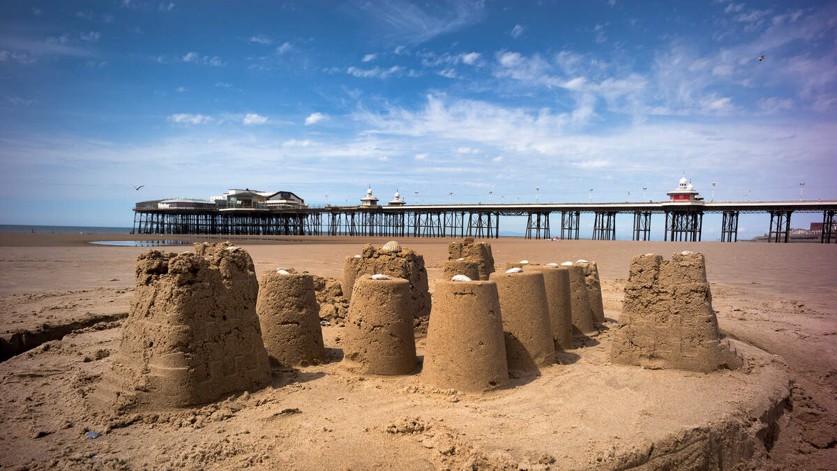 PHOTOS: Cold Winds Create Unusual Frozen Sand Sculptures On Lake Michigan