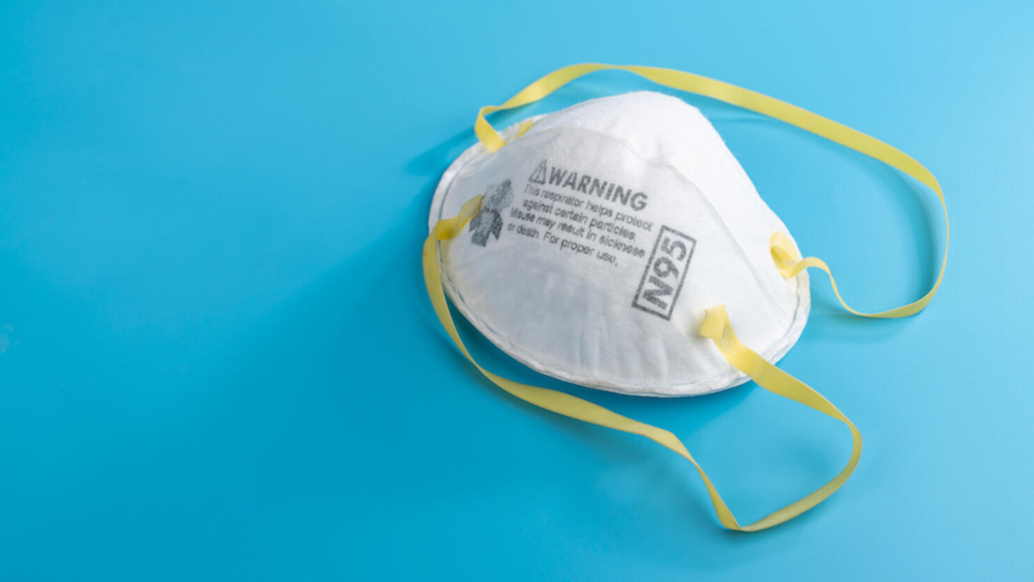 N95 Respirators and Surgical Masks (Face Masks). White medical mask isolate. Face mask protection against pollution, virus, flu and coronavirus. Health care and surgical concept.