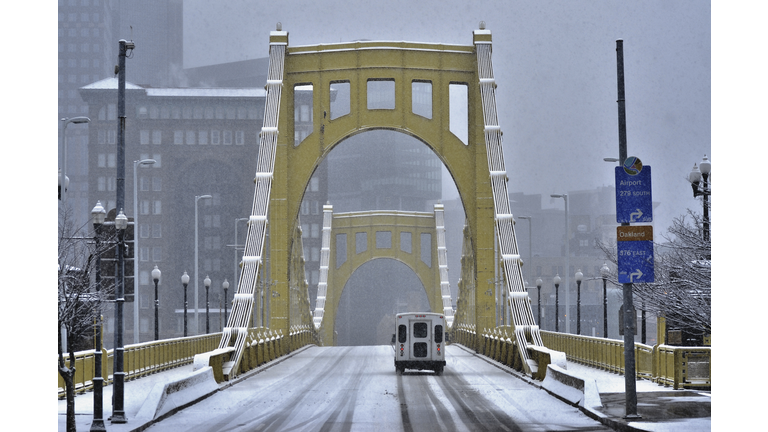 Early Morning Snowstorm on Bridge