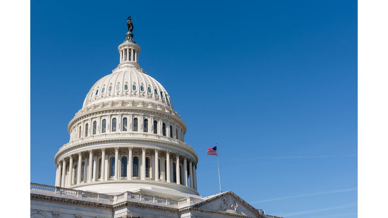 US Capitol building dome with American flag