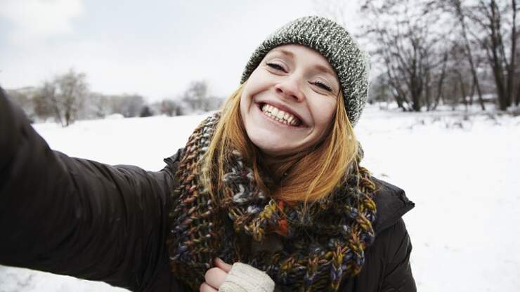 Video: Woman Snaps Selfie Atop Car Sinking into Frozen River | Coast to ...