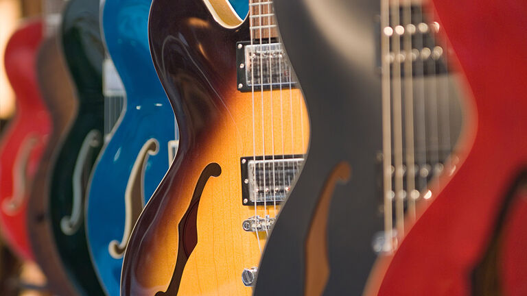 Guitars Hanging in a Store