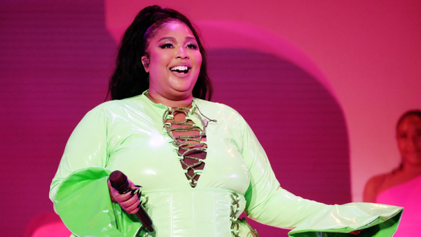 Lizzo Turns Heads In Chic High-Waisted Jeans & Blouse For Low-Key Dinner