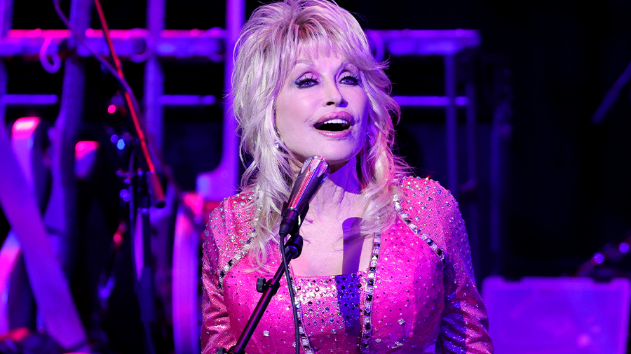 Dolly Parton Addresses Rumors She Insured Her Breasts For Millions Iheart 7733