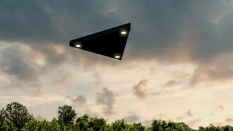 Watch: Strange Black Triangular UFO Filmed Floating Over City in Germany