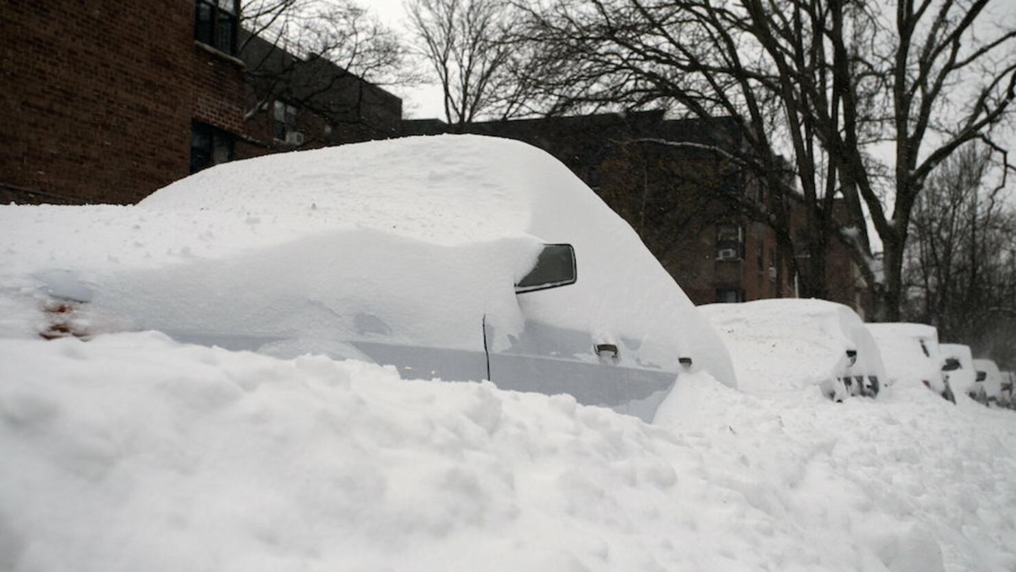 Snow piled up on cars during Long Island snowstorm