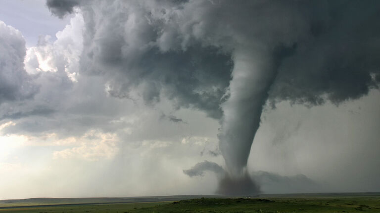 This tornado demonstrates "Barber Poling": the rotational bands twisting around the tornado itself, Campo, Colorado, USA