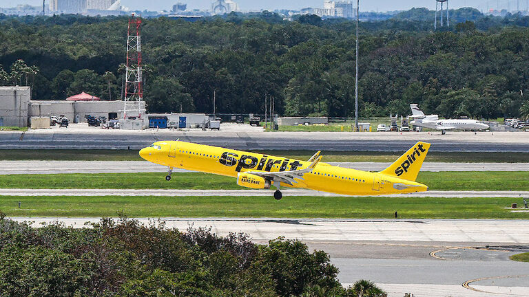 A Spirit Airlines aircraft takes off at Orlando