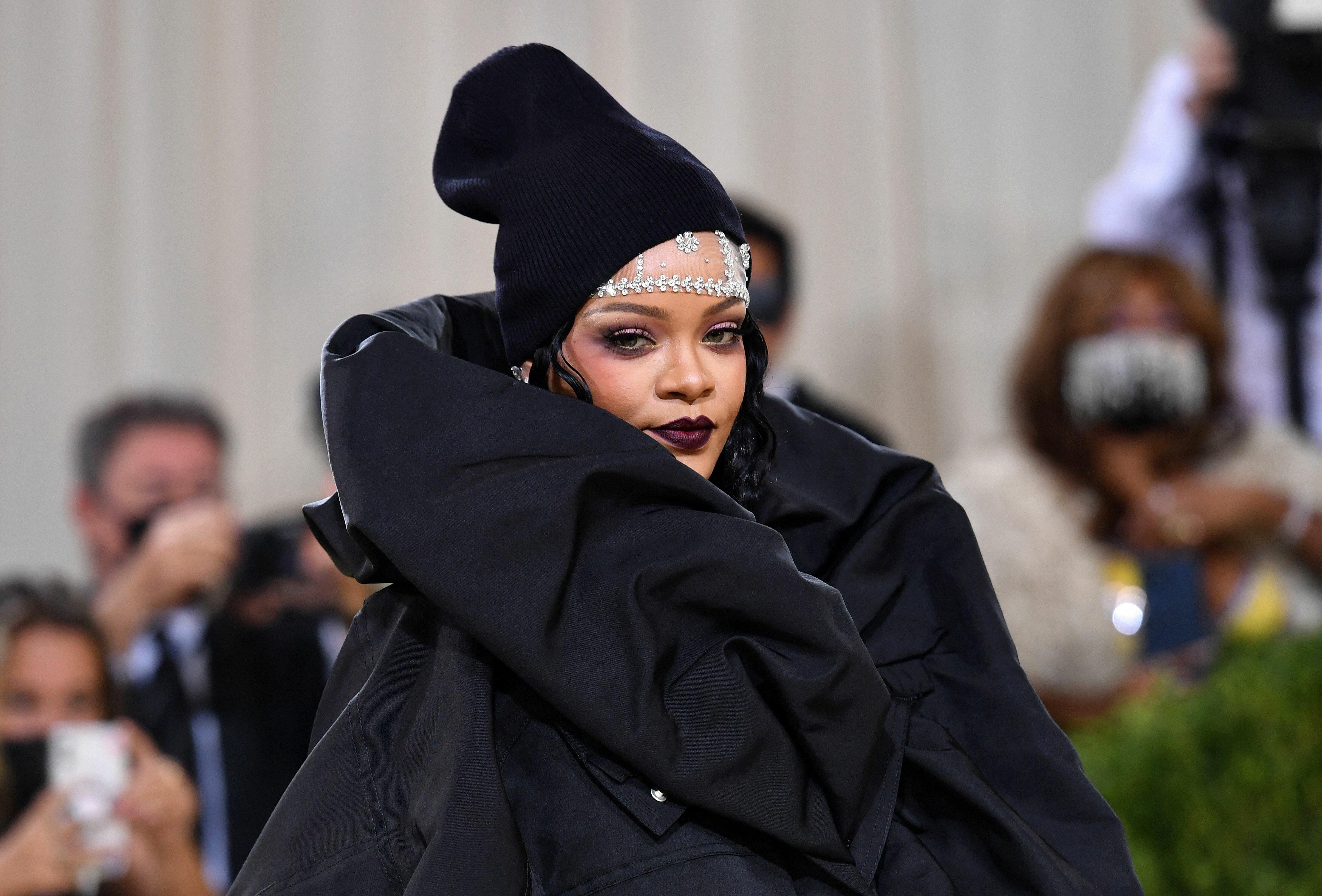 Rihanna Shows Off Baby Bump In Stunning New Photos | iHeart