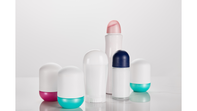 Bottles roller spray deodorant isolated,Close-up of lipstick on white background