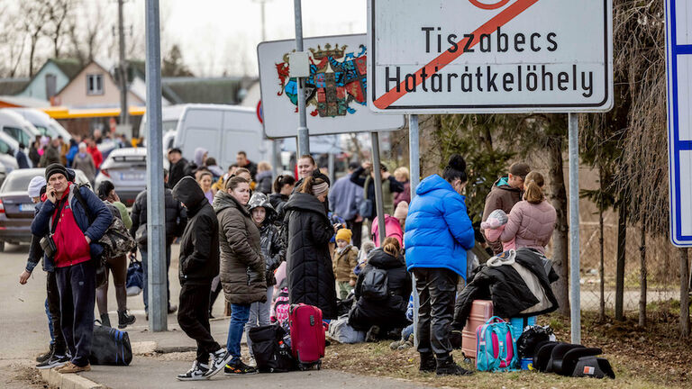 Ukrainians Flee To Hungary Amid Russia's Armed Invasion