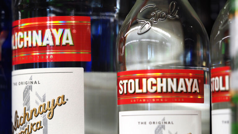Bottles of Stolichnaya vodka seen displayed on shelves of