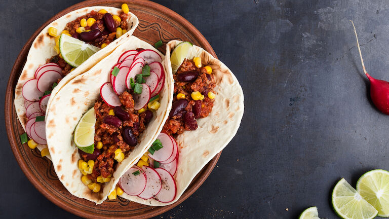 Chili con carne tacos viewed from above
